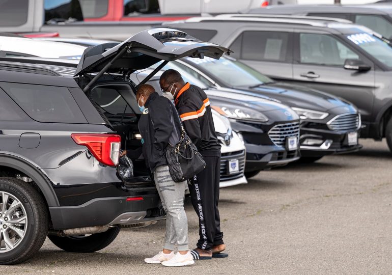 EV carmakers work to fit auto dealers into their future plans